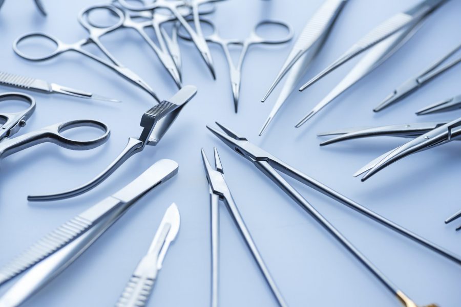 Blue tone image of assorted surgical instruments